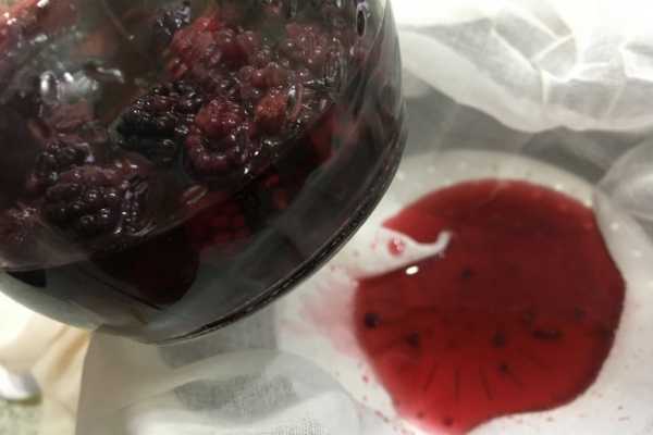 Homemade Backberry Gin - infusing and straining